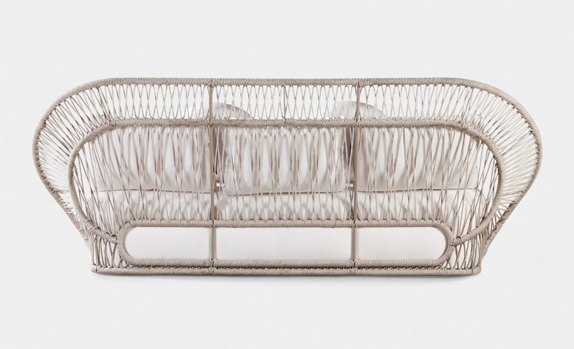 back of outdoor rope sofa on white background