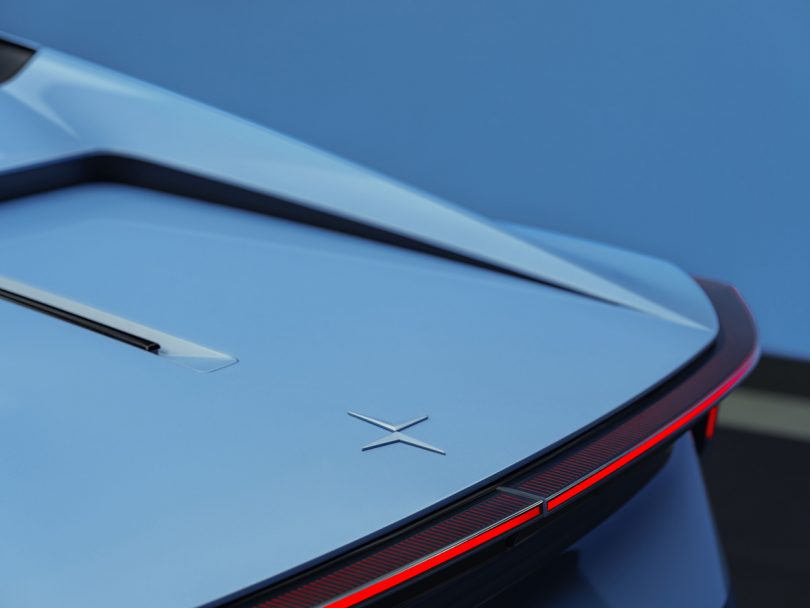 Detail of Polestar 6 rear trunk spoiler and Polestar emblem.