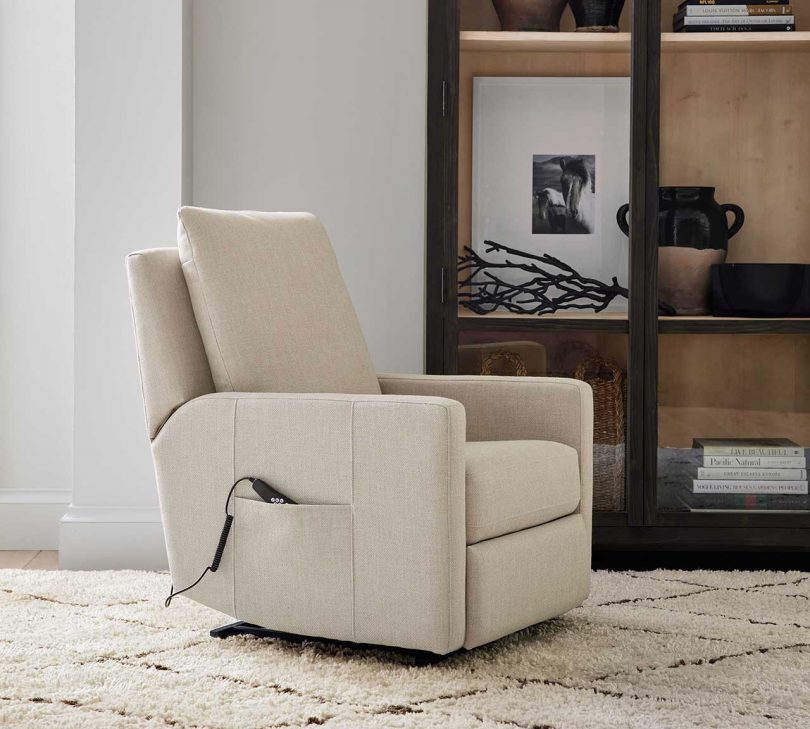 cream colored power lift recliner in the upright position