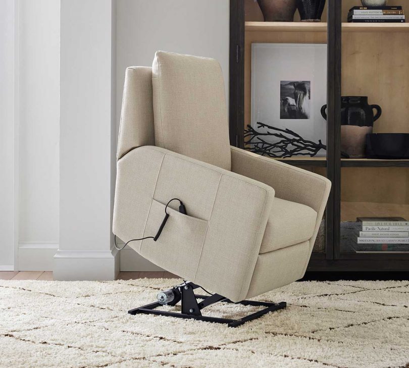 cream colored power lift recliner in the lifted position