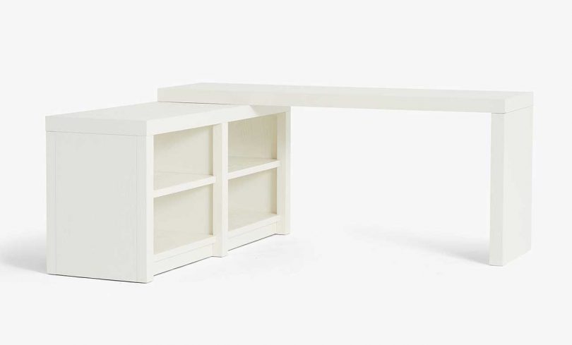 white L-shaped desk on white background