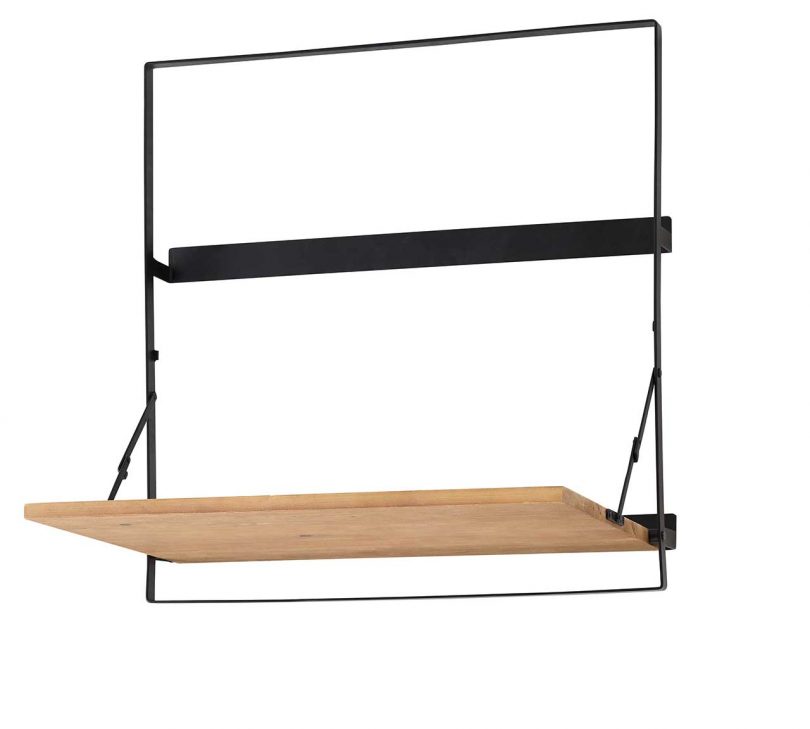 light wood and black metal folding table extended on white background