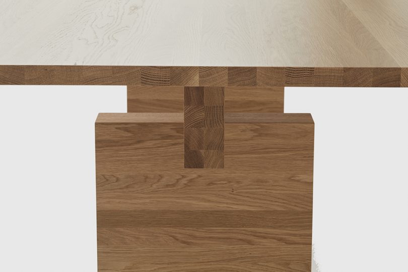 detail of rectangular dining table on white background
