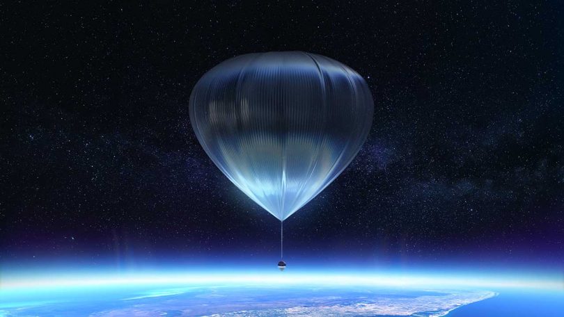 rendering of Space Perspective capsule hanging from large balloon floating in space