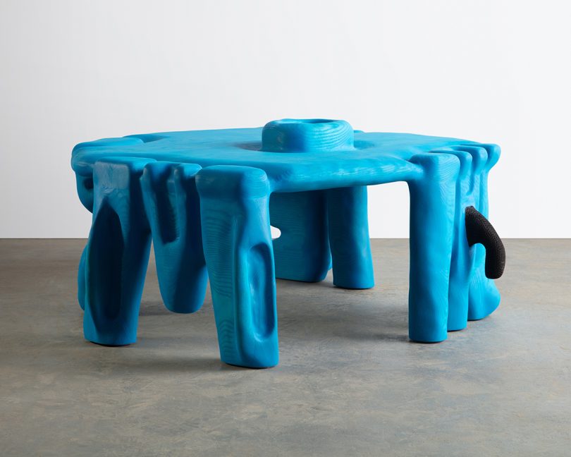 asymmetrical abstract sculptural coffee table in bright blue