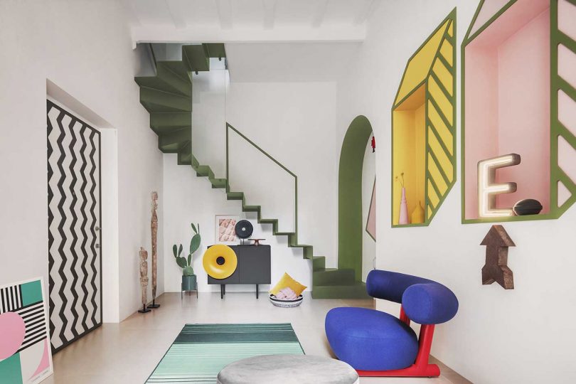 modern apartment interior with colorful furnishings that give nod to the Memphis movement and Ettore Sottsass