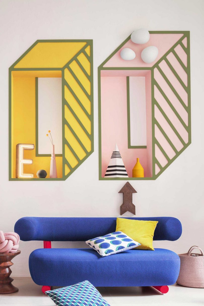 modern apartment interior with colorful furnishings that give nod to the Memphis movement and Ettore Sottsass