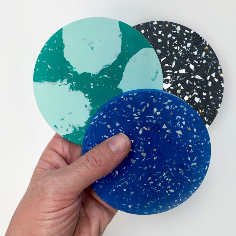 three circular discs made of terrazzo waste material