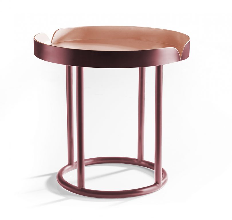 maroon and pink side table on white background