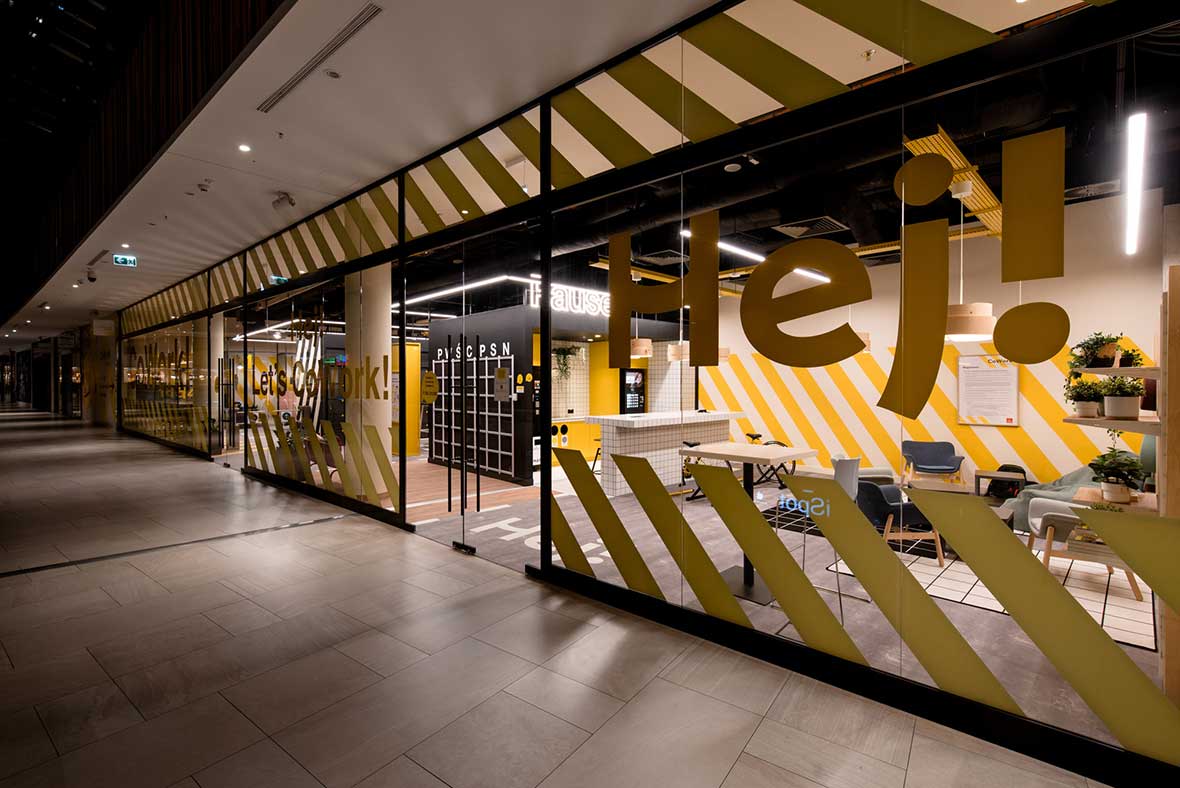 front exterior of coworking space with graphic black and white patterns and bold colors