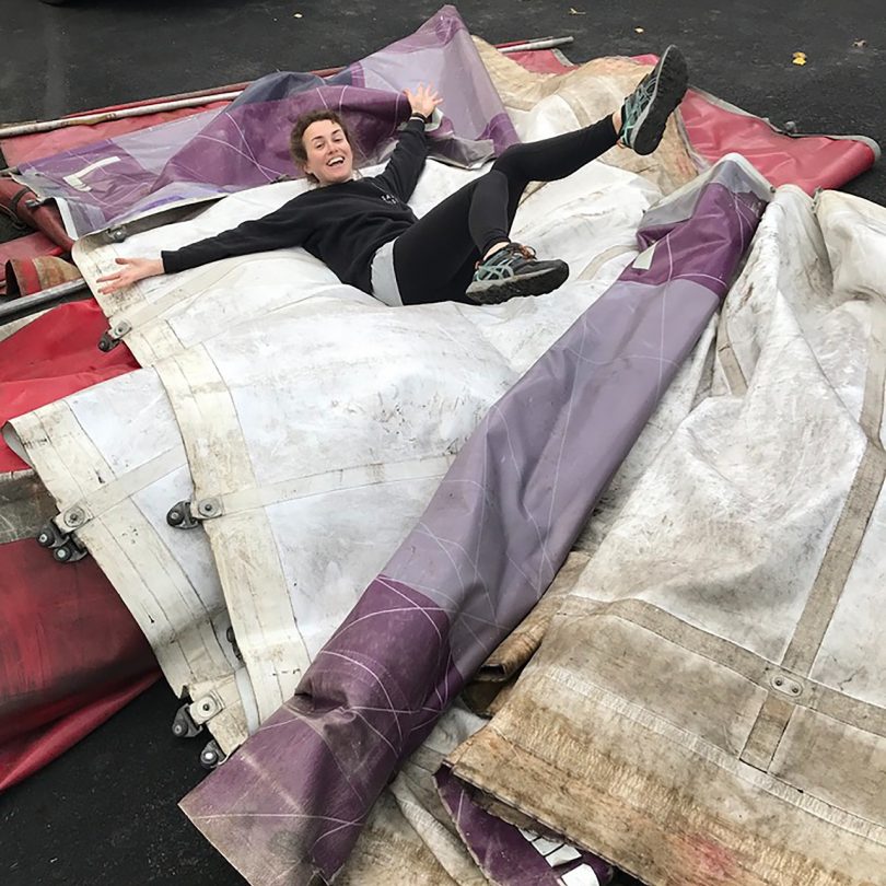 woman laying on used tarps