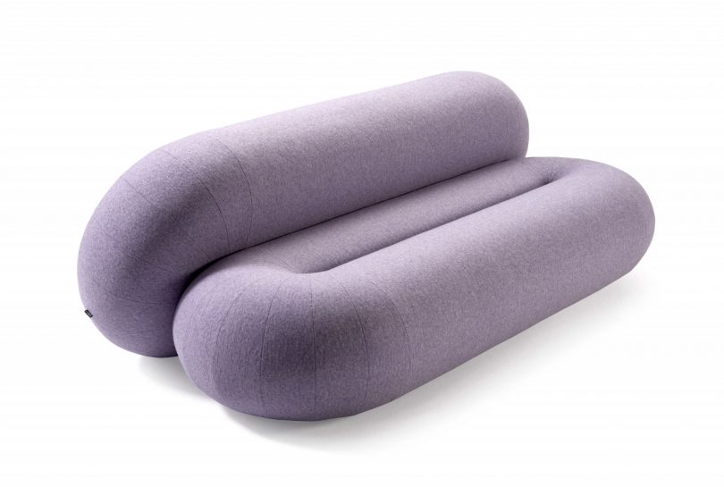 abstract lavender colored sofa on white background