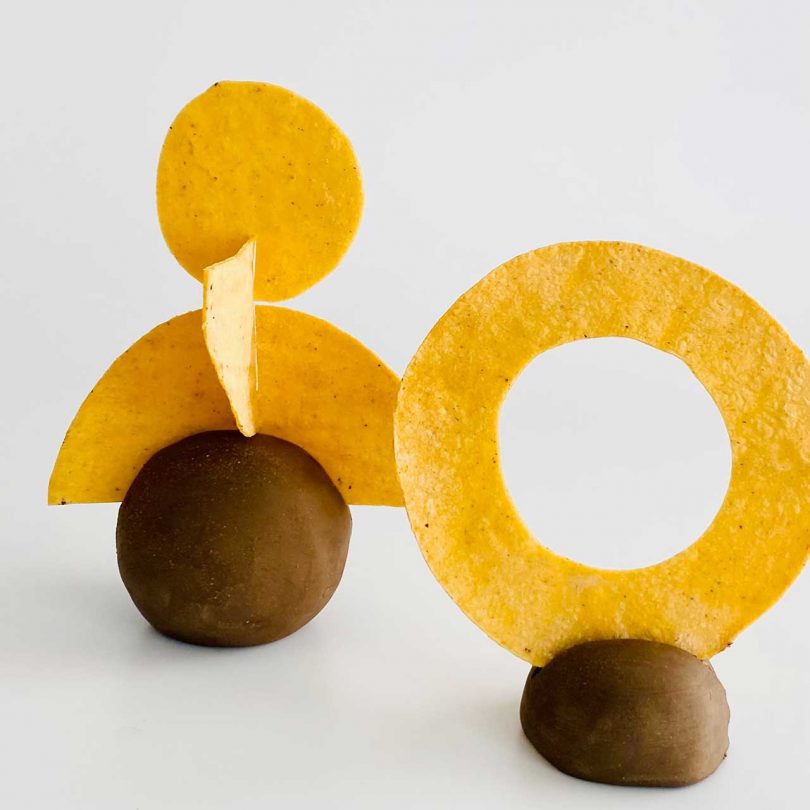 tortillas cut in shapes and standing up as sculptures