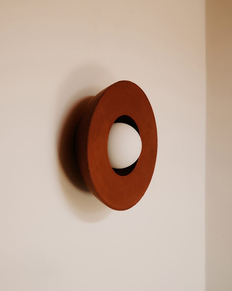 rust colored wall lamp