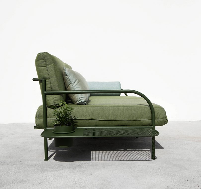 side view of army green outdoor sofa
