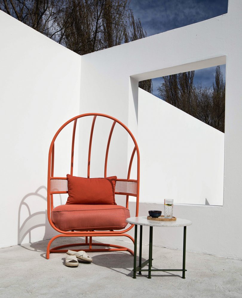 red outdoor chair and side table