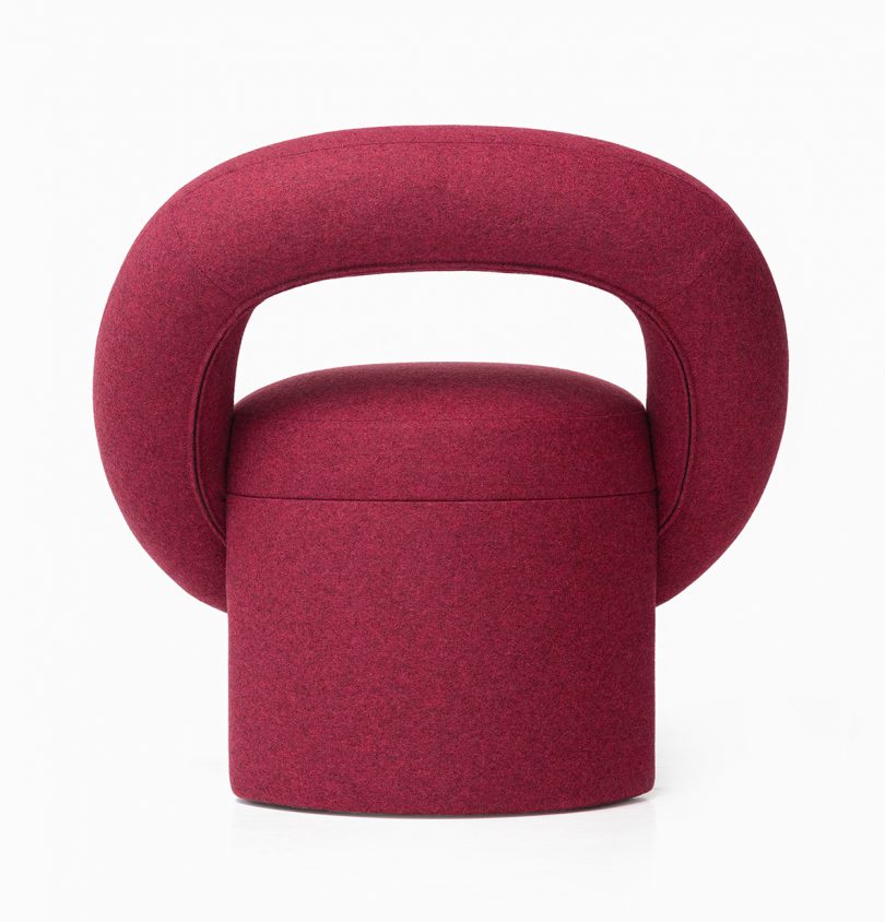 back of modern dark red armchair on a white background