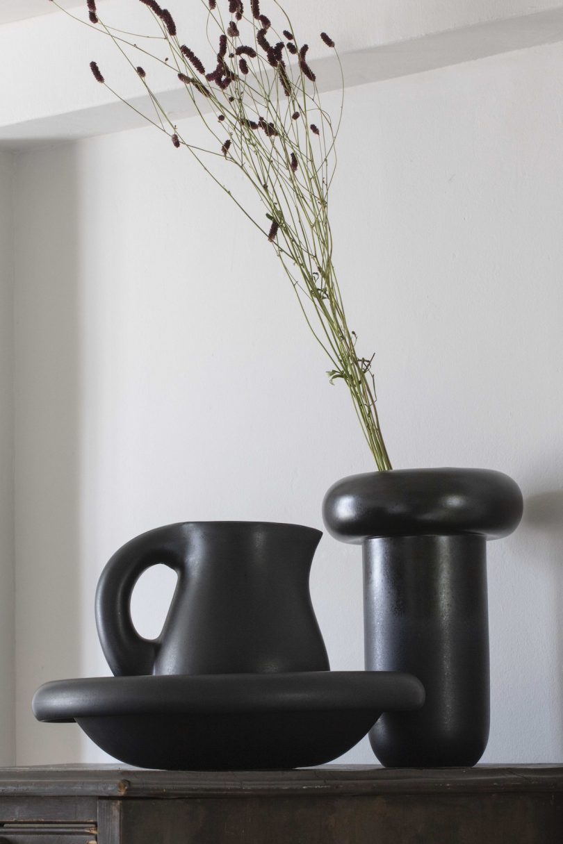 black ceramic jug and vase