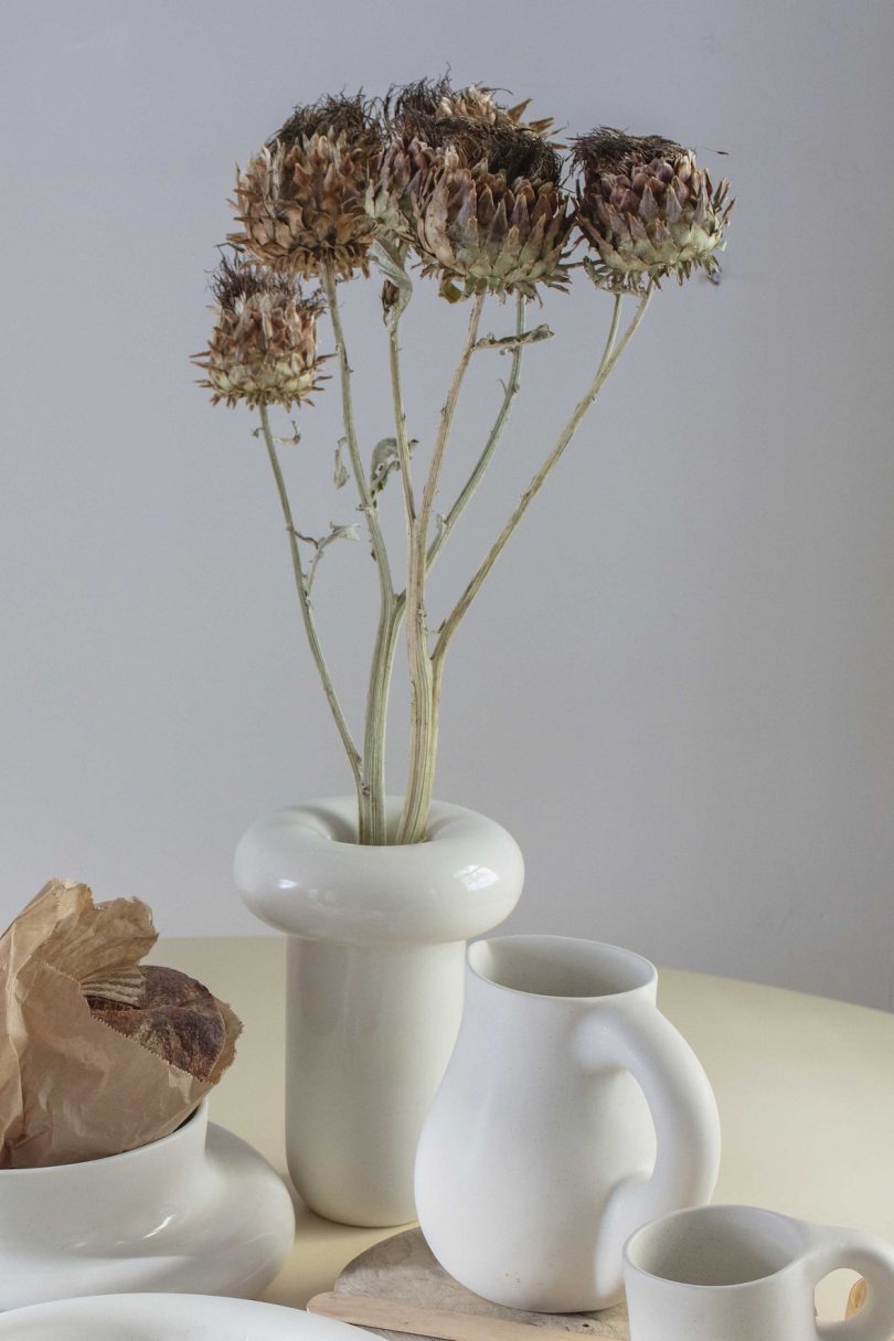 white ceramic vase and jug