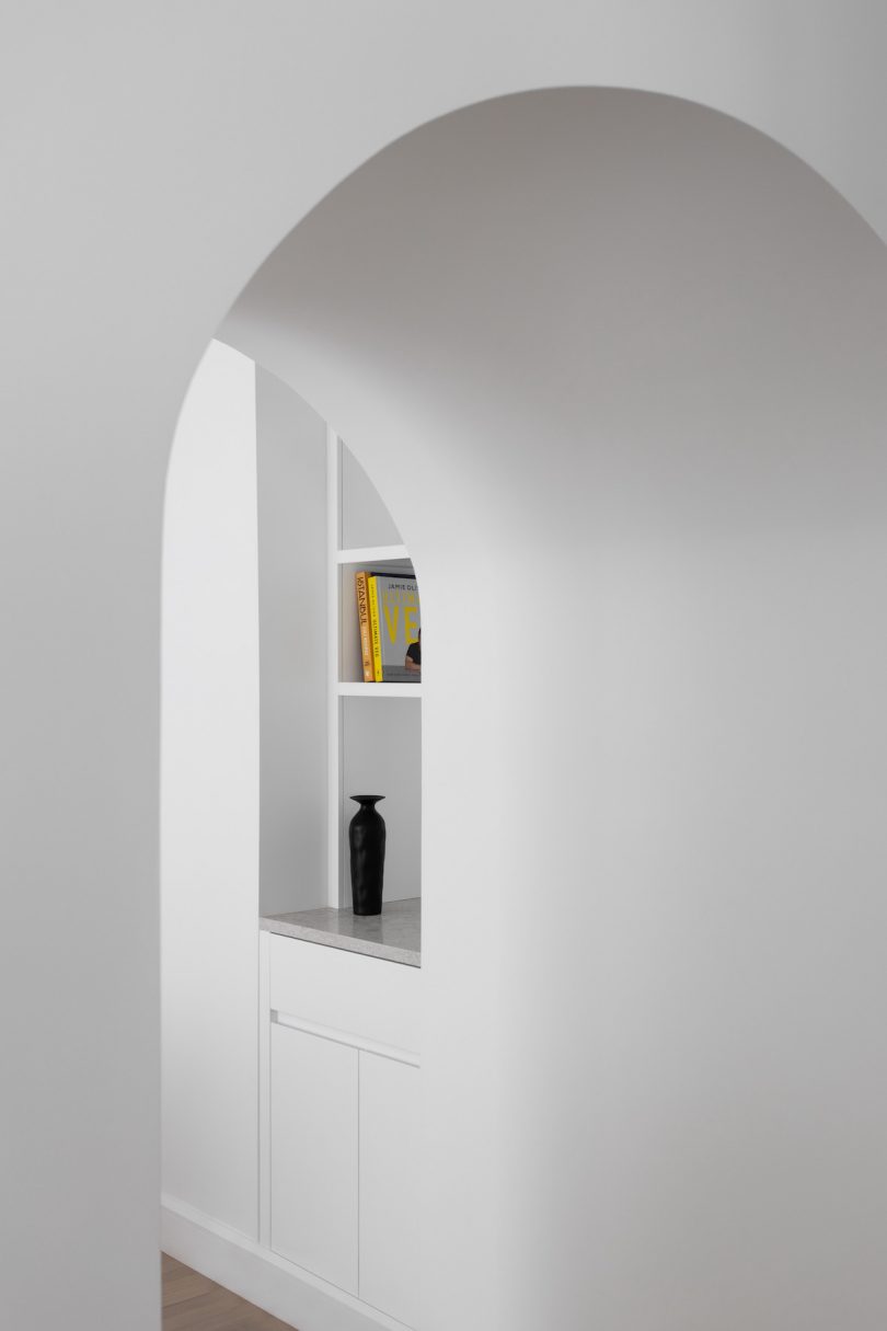 Archways create transitions between the spaces