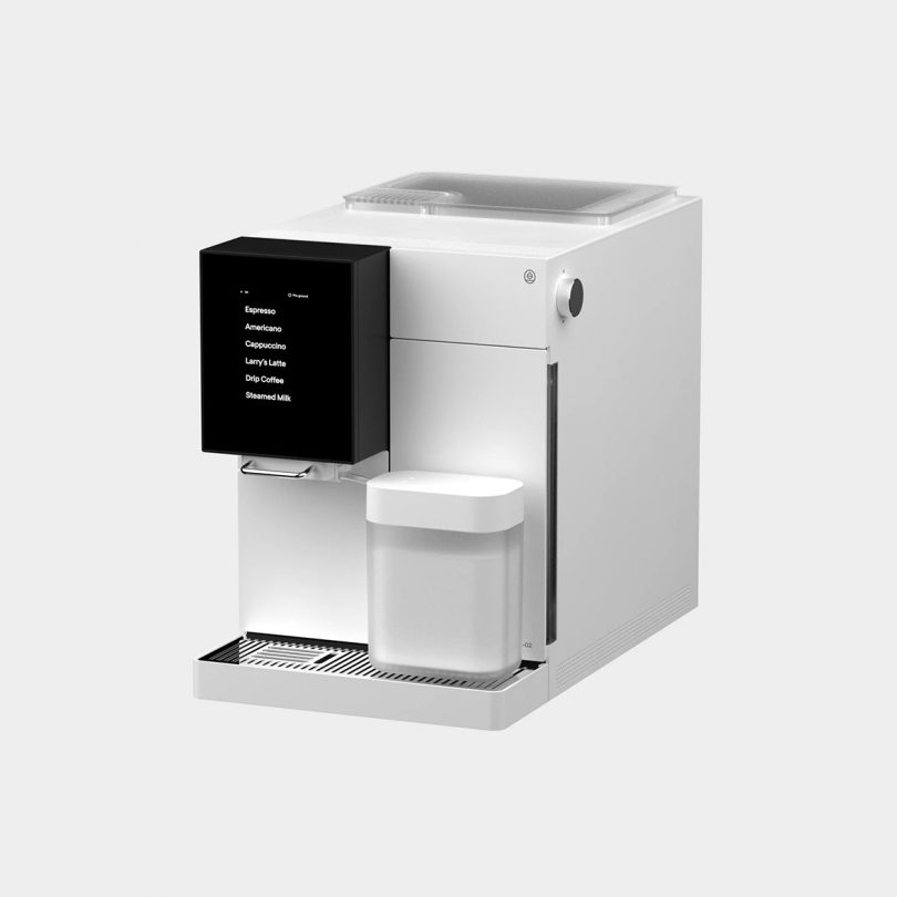 Angled front view of white TK-02 coffee machine.