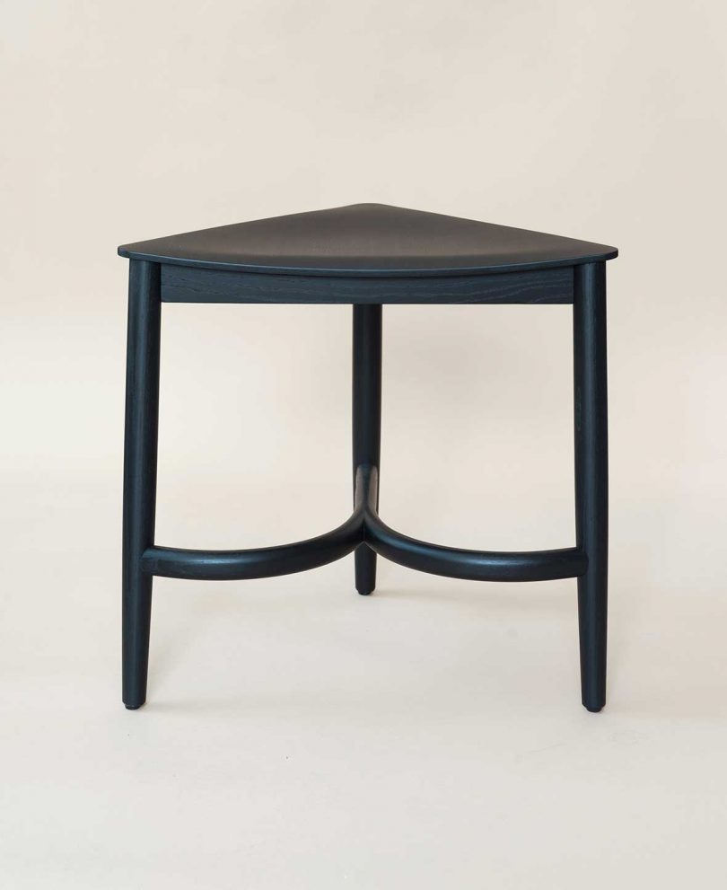 short black triangular stool