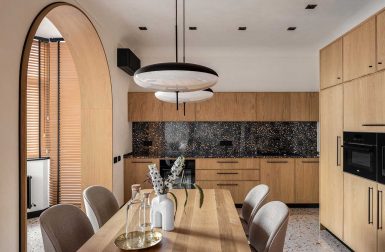 A Modern Kyiv Apartment With New Arches and Shades of Persimmon