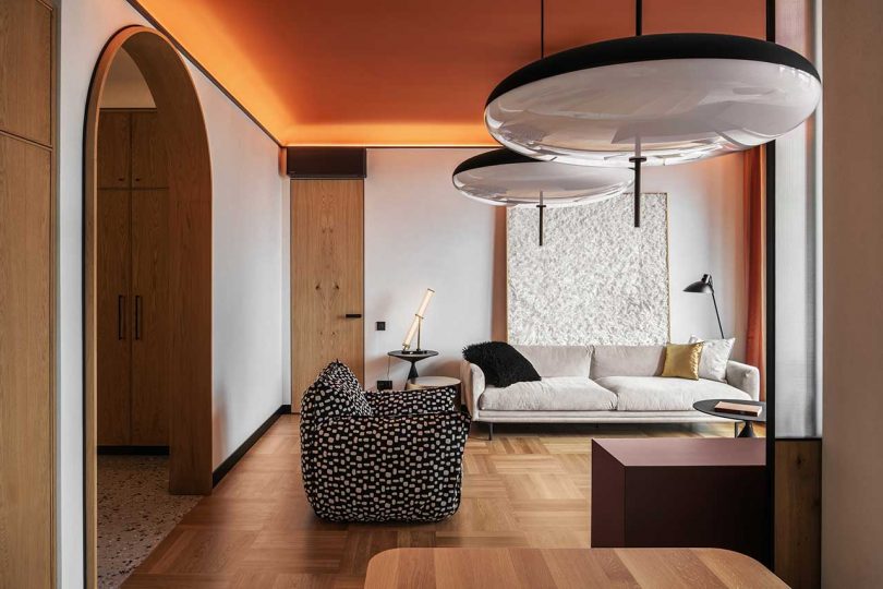 view of modern apartment interior of one side of living room with persimmon ceiling