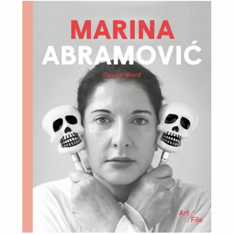 book cover with photo of a woman holding two skull shaped maracas and reading MARINA ABRAMOVIC