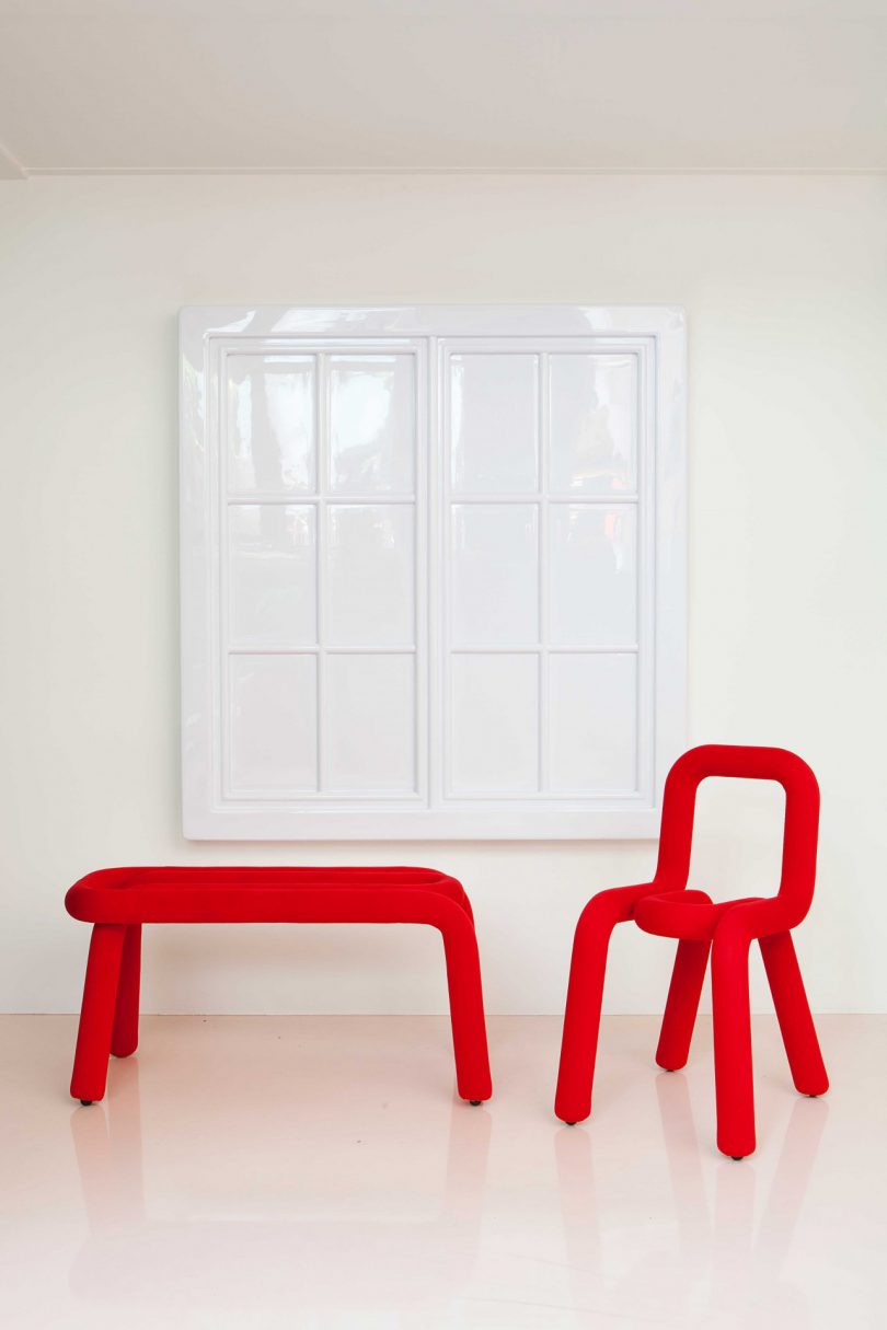 red bench and tube chair