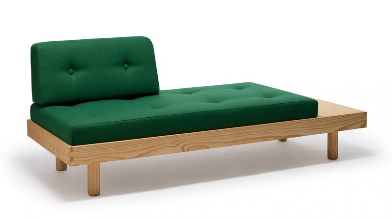 modern green daybed on white background