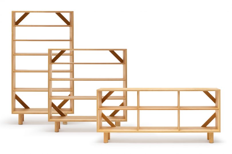 three wooden sets of shelves in varying heights
