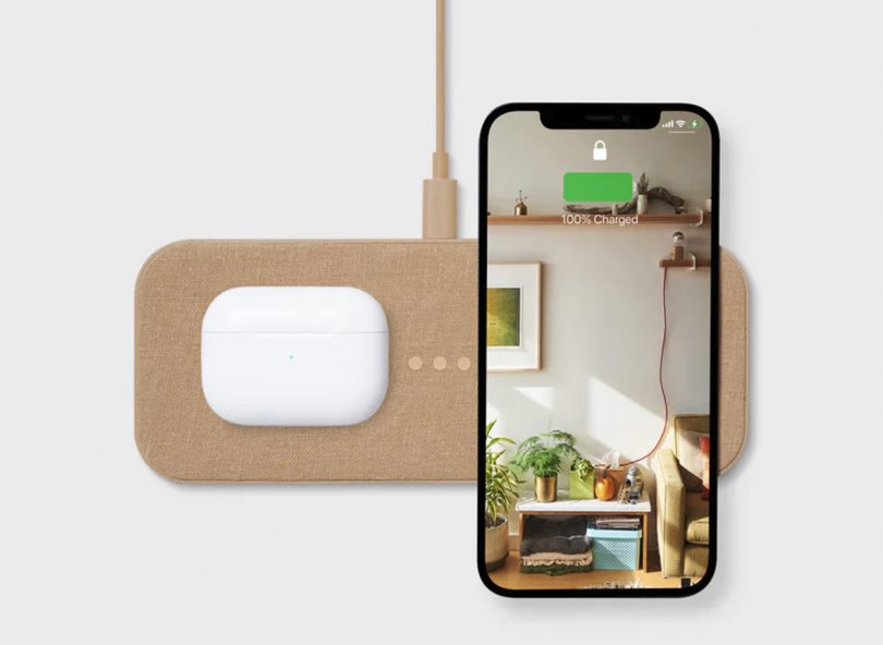 CATCH:2 wireless charging device in camel color with AirPod case and iPhone shown placed upon it recharging.