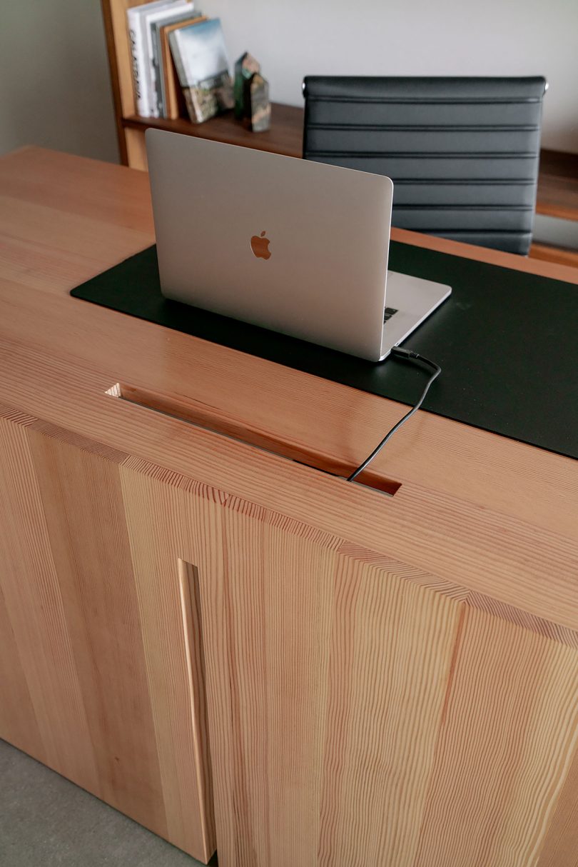 detail of styled minimal light wood desk
