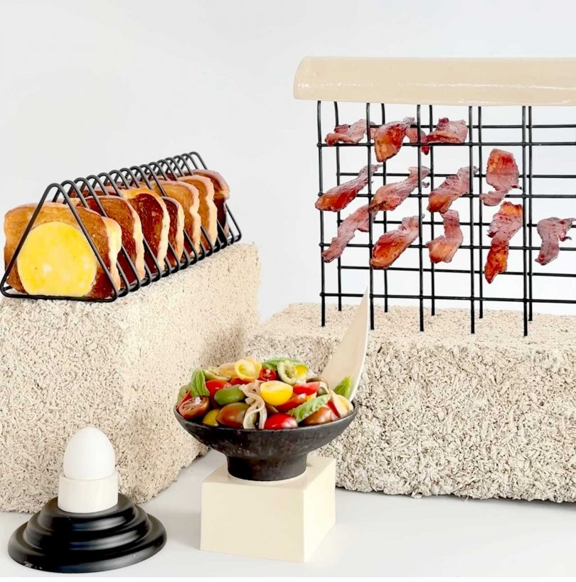 unique food display sculptures holding breakfast items