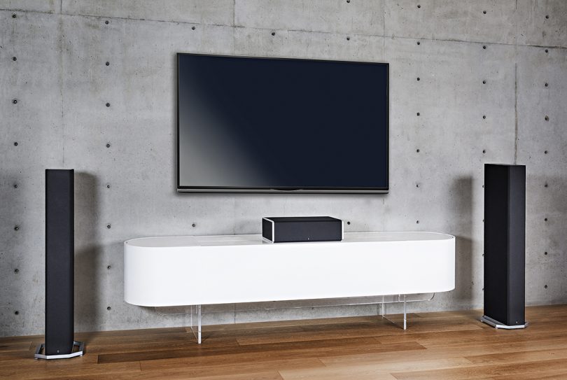 white console with flatscreen television hanging on the wall above it