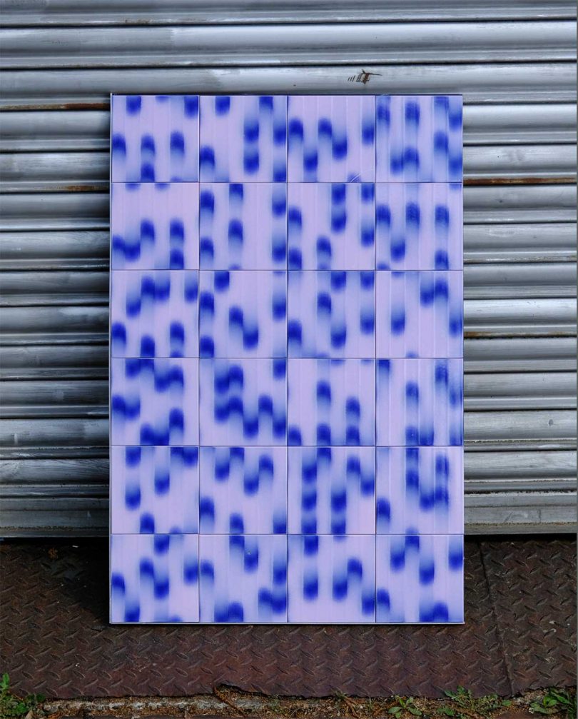 panel of graphic patterned tile in blue and white tile