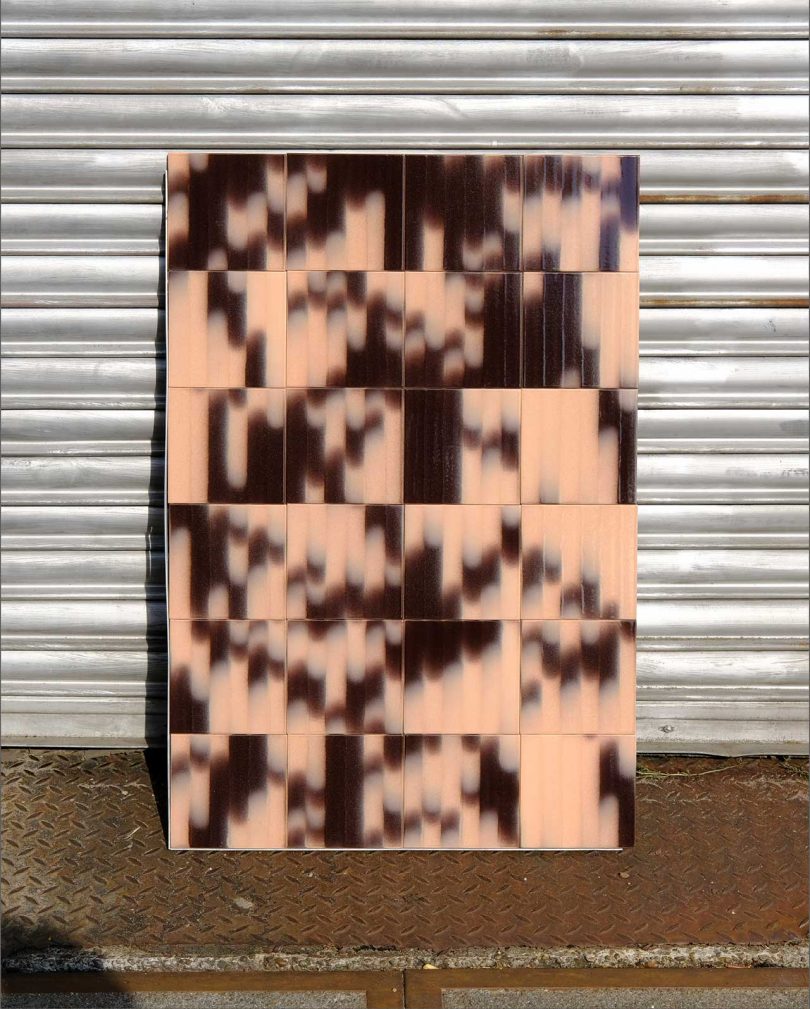 panel of graphic patterned tile in pink and black tile