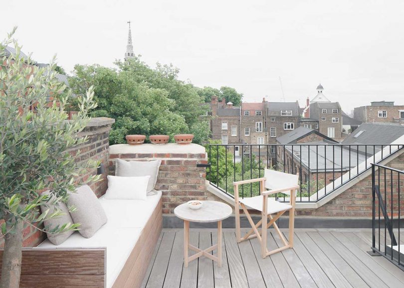 rooftop deck view with built-in seating 