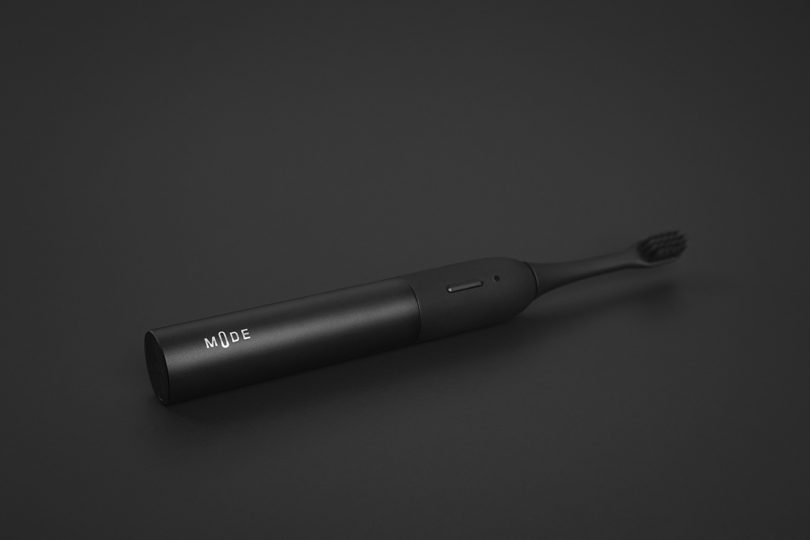 diagonal shot of minimalist black electric toothbrush 
