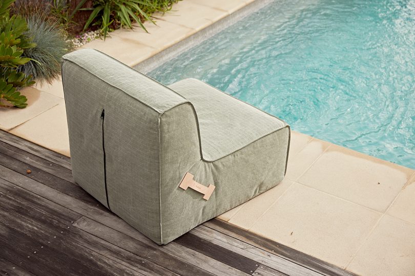 green canvas covered outdoor chair