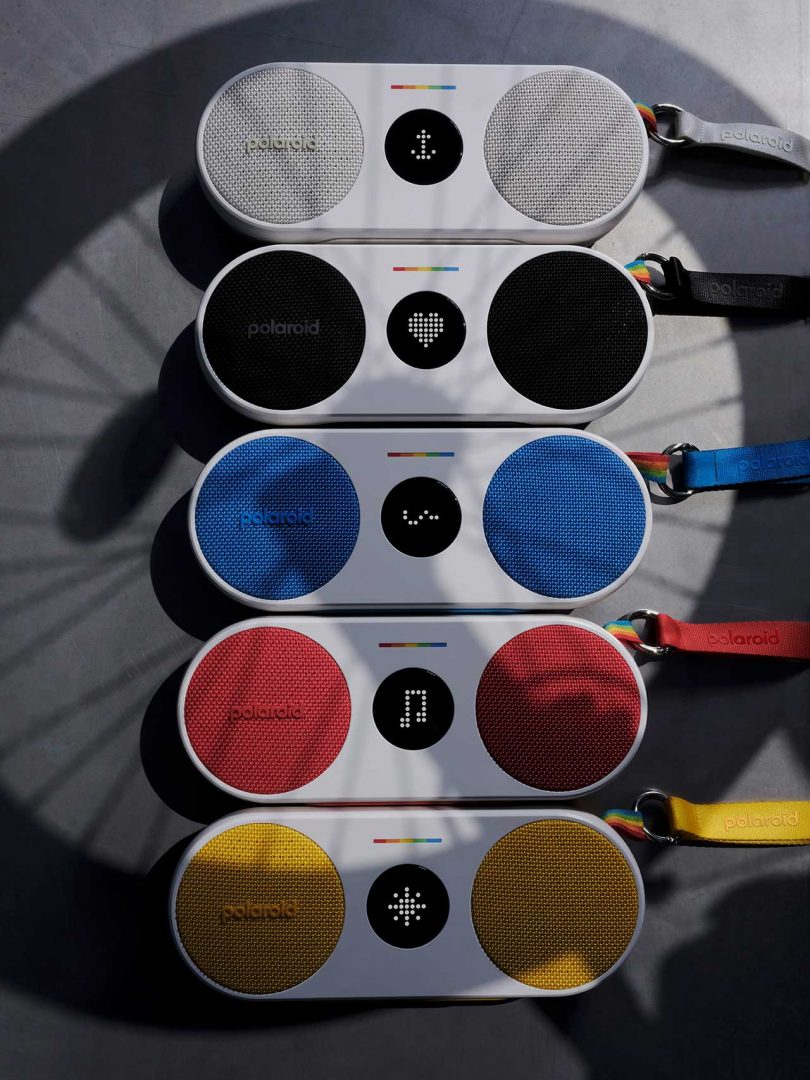 Five POlaroid P2 music players in a row in all colors
