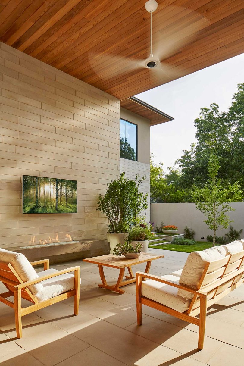 exterior shot of modern home's covered patio looking out to yard