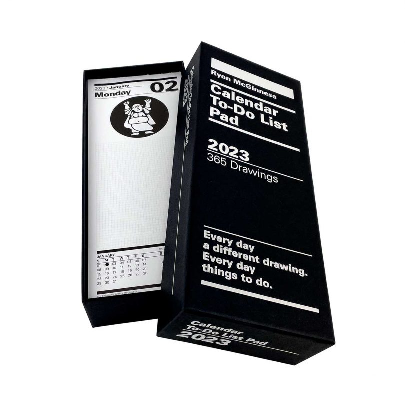elongated black box with white writing of 2023 calendar pad to-do list