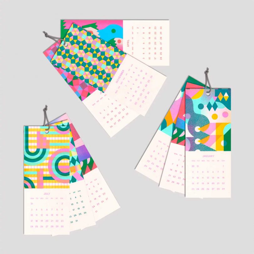 Three stacks of colorful calendar pages