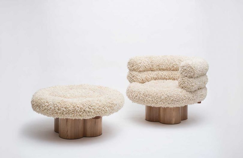 boucle armchair and ottoman with wood base