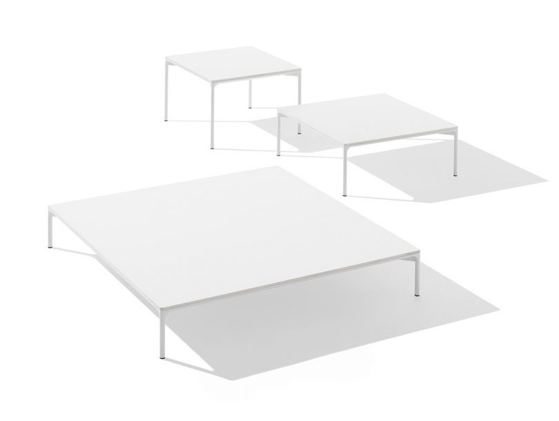 three minimal coffee and end tables in white on white background