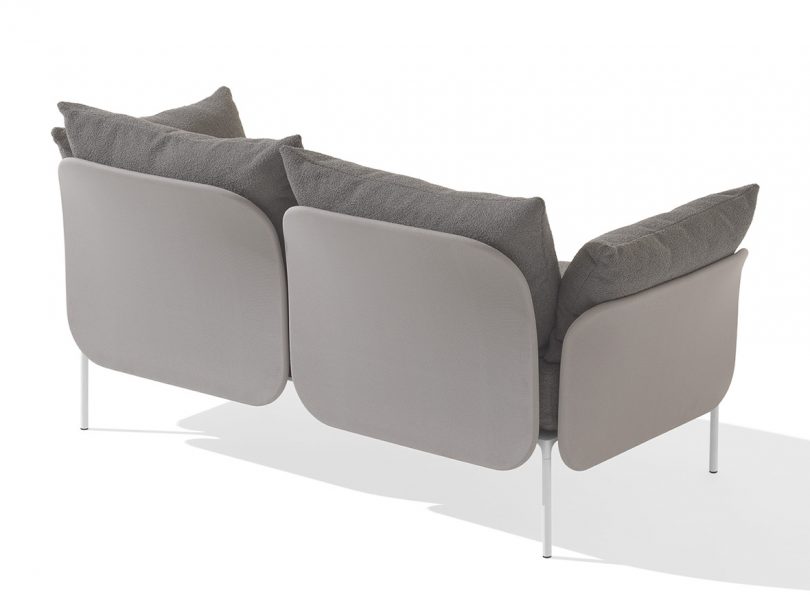 backside of 2-seater sofa on white background