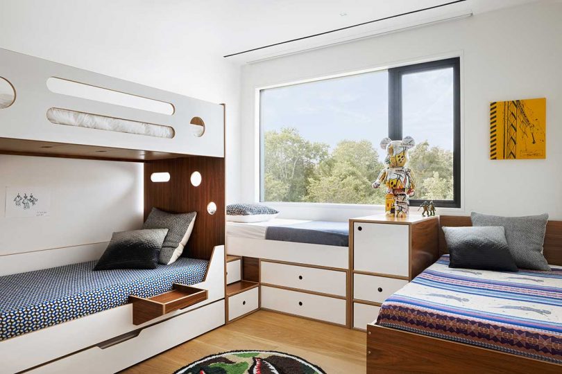 angled view of modern kids room with bunk beds