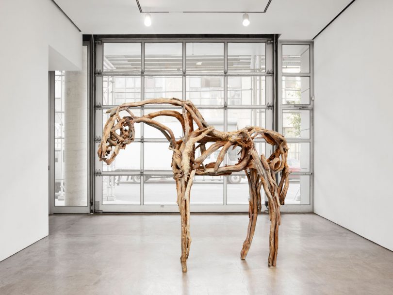 Large horse sculpture "Three Rivers" at entrance of gallery
